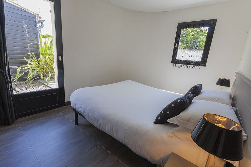 Photo 6 : CHAMBRE d'une maison située à La Flotte, île de Ré.