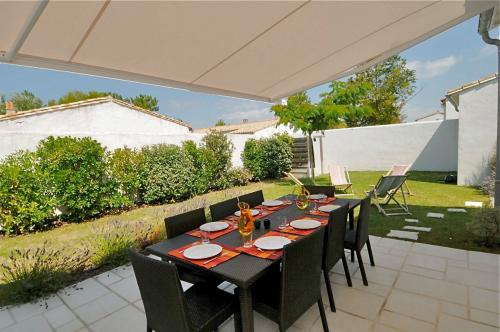 Photo 6 : TERRASSE d'une maison située à Le Bois-Plage-en-Ré, île de Ré.