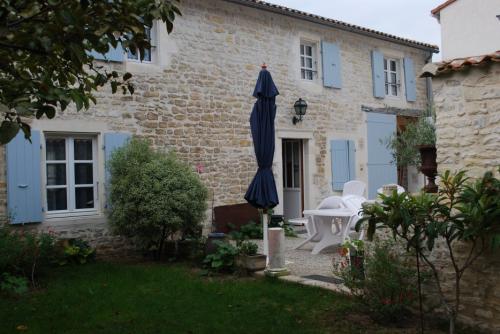 Photo 2 : EXTERIEUR d'une maison située à La Flotte-en-Ré, île de Ré.