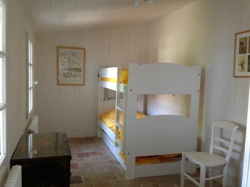 Photo 8 : CHAMBRE d'une maison située à Saint-Martin, île de Ré.