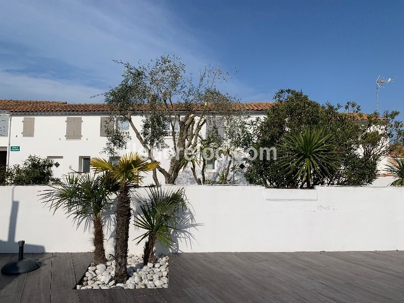 Photo 23 : EXTERIEUR d'une maison située à La Couarde-sur-mer, île de Ré.