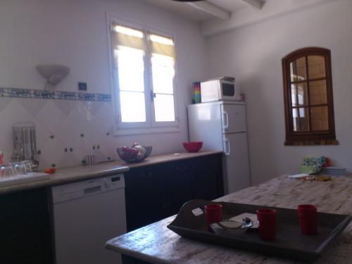Photo 4 : CUISINE d'une maison située à Rivedoux-Plage, île de Ré.