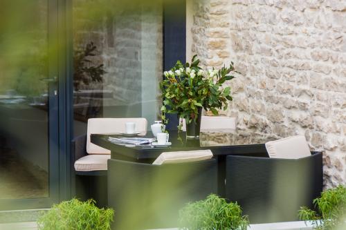 Photo 16 : TERRASSE d'une maison située à Le Bois-Plage, île de Ré.