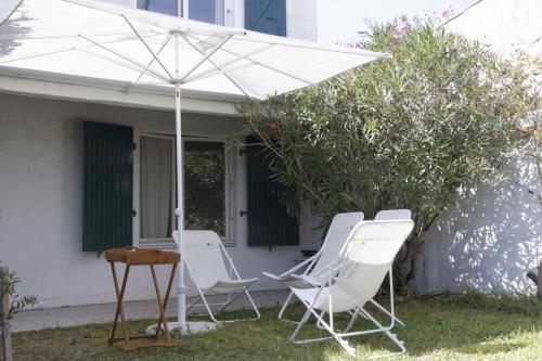 Photo 1 : JARDIN d'une maison située à Les Portes-en-Ré, île de Ré.