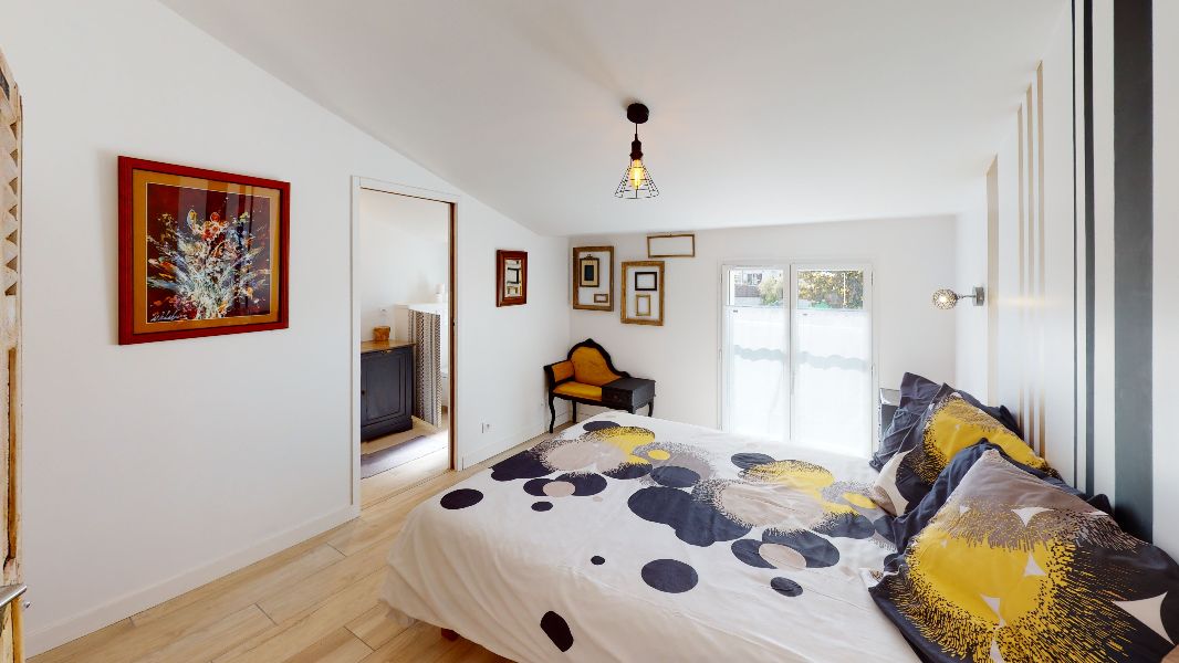 Photo 12 : CHAMBRE d'une maison située à Ars en Ré, île de Ré.