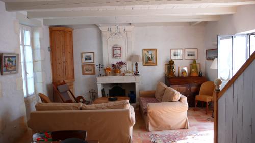 Photo 2 : SEJOUR d'une maison située à La Couarde-sur-mer, île de Ré.