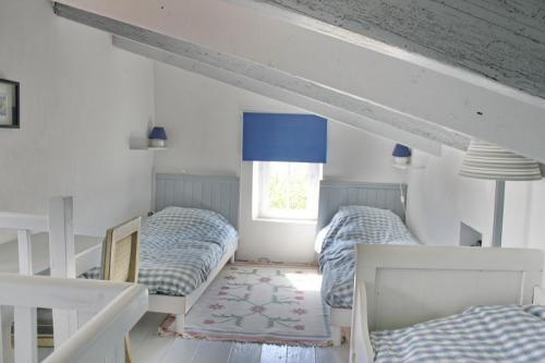 Photo 17 : CHAMBRE d'une maison située à Saint-Clément-des-Baleines, île de Ré.