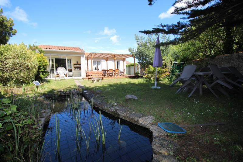 Photo 5 : JARDIN d'une maison située à La Couarde-sur-mer, île de Ré.