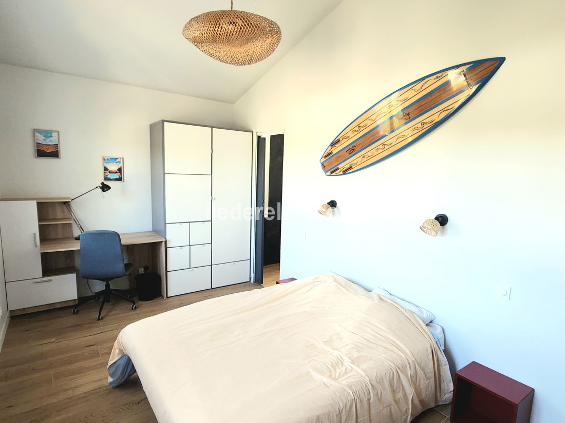 Photo 15 : CHAMBRE d'une maison située à La Couarde-sur-mer, île de Ré.