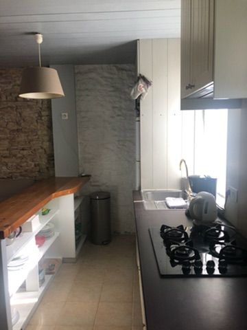 Photo 4 : CUISINE d'une maison située à Les Portes-en-Ré, île de Ré.