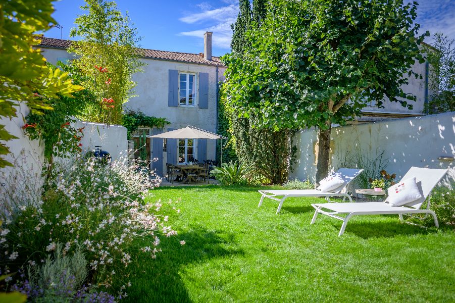 Photo 1 : JARDIN d'une maison située à Le Bois-Plage, île de Ré.