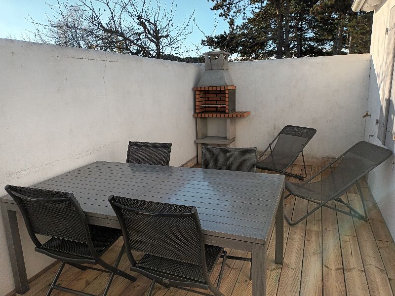 Photo 6 : TERRASSE d'une maison située à Le Bois-Plage-en-Ré, île de Ré.