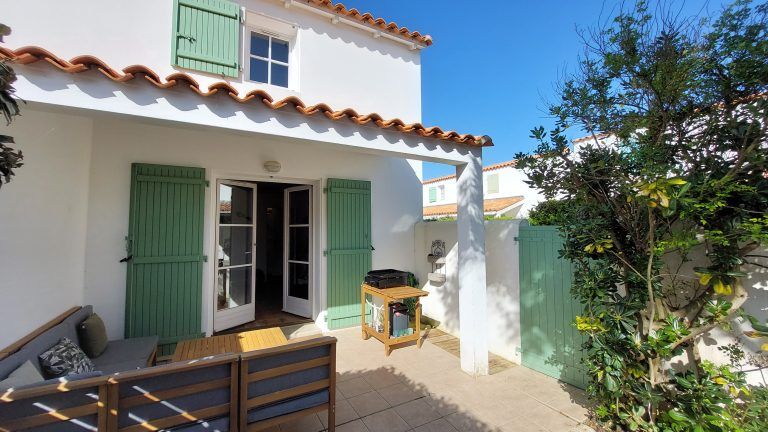 Photo 1 : EXTERIEUR d'une maison située à Ars en Ré, île de Ré.