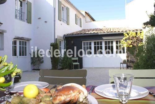 Photo 1 : JARDIN d'une maison située à La Couarde, île de Ré.