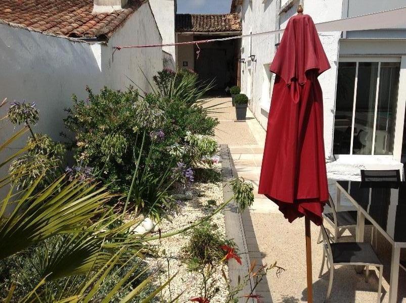 Photo 3 : EXTERIEUR d'une maison située à Le Bois-Plage-en-Ré, île de Ré.